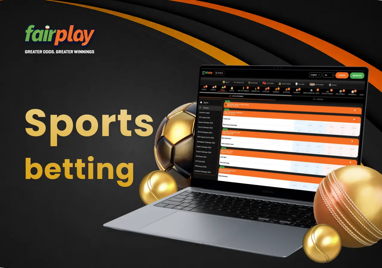 Laptop displaying sports betting fairplay markets with footballs placed beside the screen.